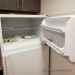 White GE Fridge with Top Load Freezer